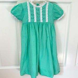 Smockingbird green Swiss dot dress